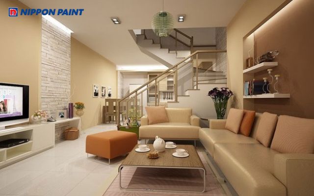 Thiết kế phòng khách màu vàng đất cho gia chủ sinh năm 1968