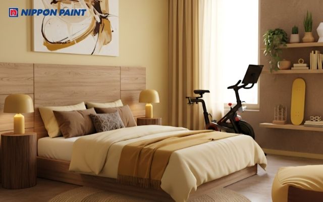 Phòng ngủ nổi bật với gam vàng nhạt - nâu gỗ, tạo cảm giác ấm áp, hài hòa và thư giãn