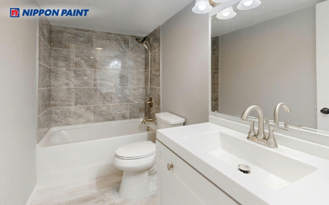 Kem ghi pha xám sáng, giúp không gian WC trông rộng hơn