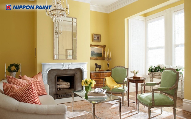 Sơn phòng khách trắng kem kết hợp vàng nhạt giúp không gian sáng và cân bằng năng lượng