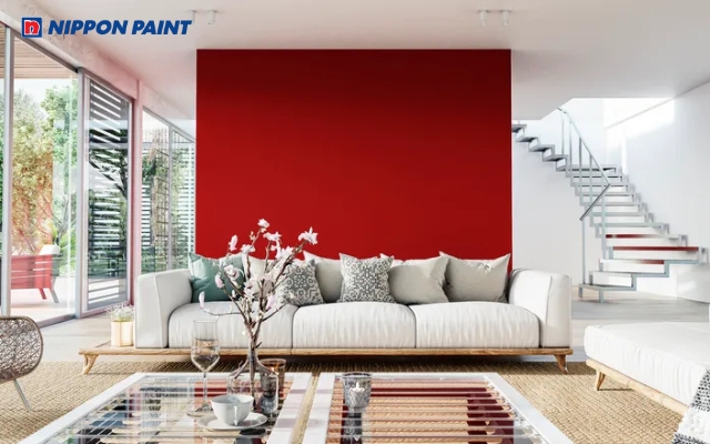 Phòng khách màu đỏ phối trắng tạo cảm giác ấm cúng, sang trọng và rất hợp tuổi 1991