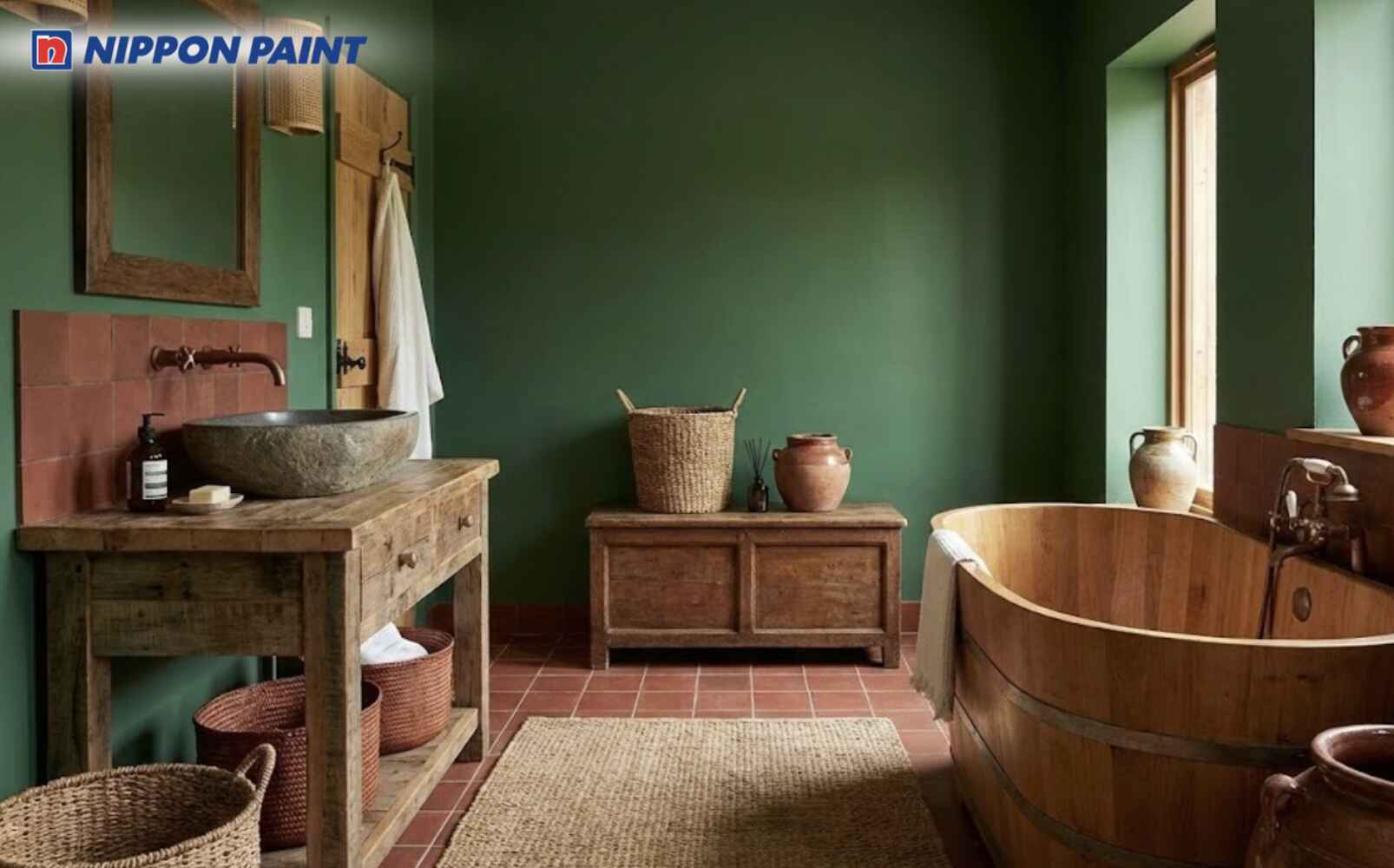  Phối xanh lá làm nền, điểm đỏ nâu giúp phòng vệ sinh có chiều sâu và ấm hơn