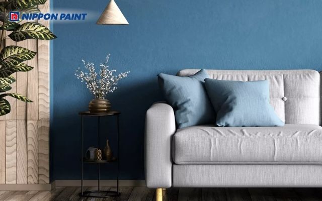 Phòng khách xanh đậm sang trọng, mang chiều sâu và điểm nhấn cá tính