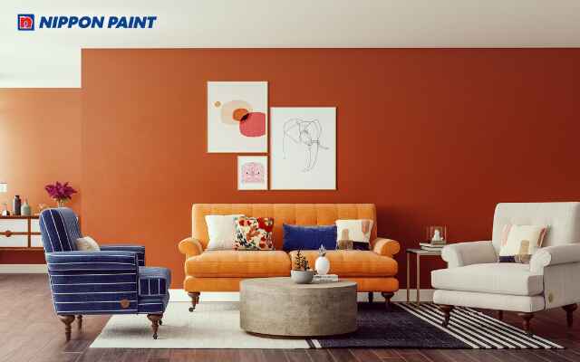 Dùng gam màu cam giúp phòng khách nổi bật nhưng vẫn giữ được phong thủy