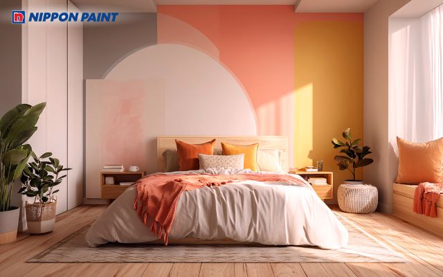 Phối màu hồng pastel cùng cam và vàng nhạt giúp phòng ngủ trở nên sinh động hơn