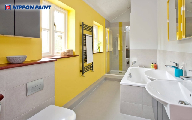 Màu trắng kem - vàng nhạt giúp phòng tắm của bé trong vui mắt và sinh động hơn