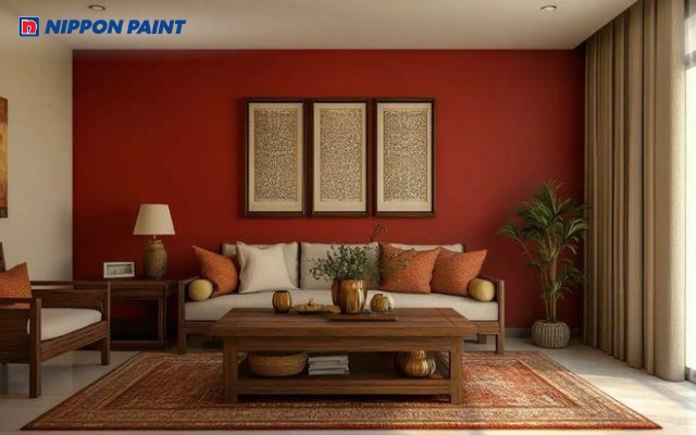 Không gian phòng khách sách sơn tường màu đỏ gạch, tạo cảm giác ấm cúng, gần gũi và thư thái