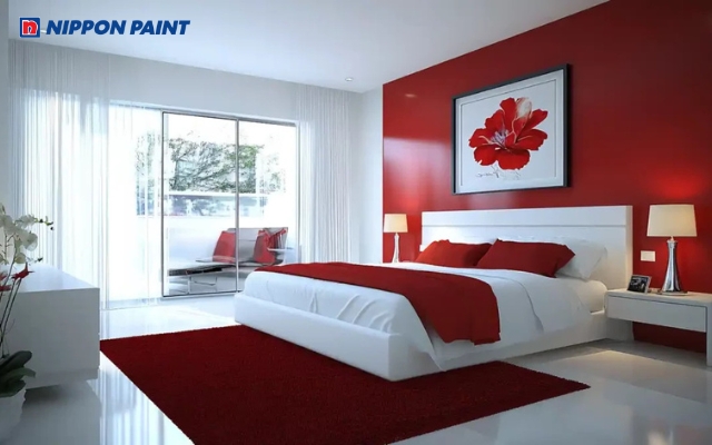 Phòng ngủ sử dụng tone đỏ nhẹ mang đến cảm giác ấm cúng và bầu không khí thư giãn