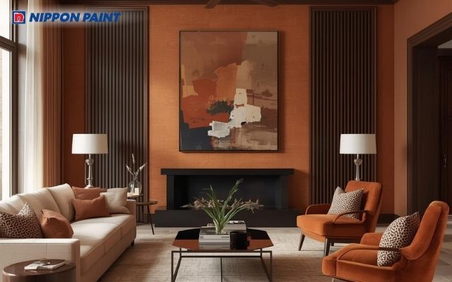 Sử dụng sơn nâu kết hợp với cam mang đến vẻ đẹp hiện đại, trầm lắng cho phòng khách