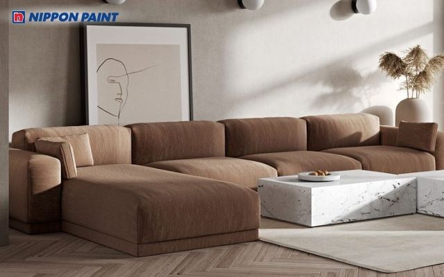 Sơn màu nâu phối cùng xám nhạt giúp tôn lên vẻ đẹp hiện đại, tối giản của phòng khách