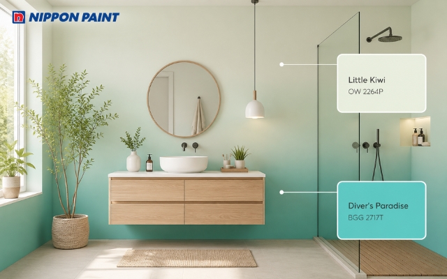Tường xanh ngọc nhạt dần lên trắng làm nổi bật khu vực lavabo