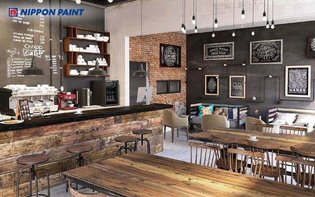 Quán cà phê bụi bặm với màu sơn trắng tối giản, kết hợp tường gạch đỏ trần đặc trưng