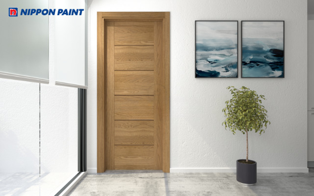 Sơn cửa gỗ hài hòa với nội thất tạo không gian cân đối và đồng điệu