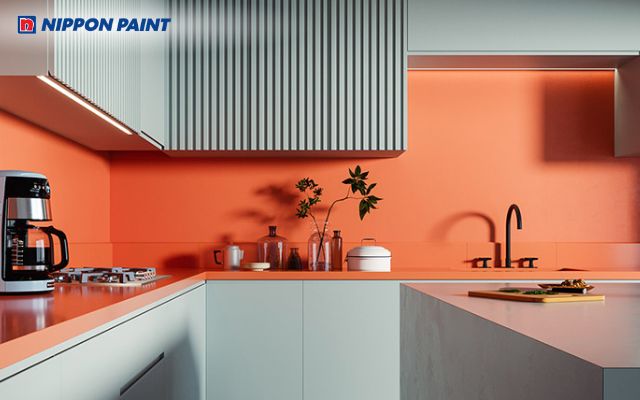 Sự kết hợp hài hoà giữa màu cam sữa - xanh tạo ra không gian ấm áp và tràn đầy sức sống