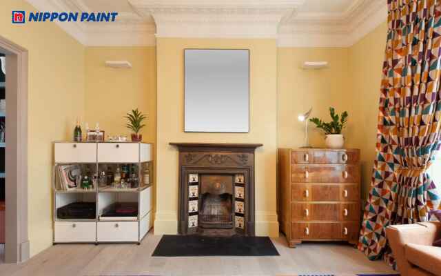 Mẫu 8: Màu vàng nhạt tạo cảm giác ấm áp và tươi tắn cho phòng khách