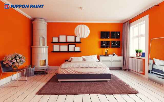 Mẫu 17: Phòng ngủ sơn màu cam kết hợp trắng mang lại cảm giác tươi sáng, ấm áp và tràn năng lượng