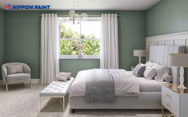 Mẫu 25: Phòng ngủ màu xanh rêu phối ánh sáng vàng nhẹ tạo cảm giác ấm áp và thư thái