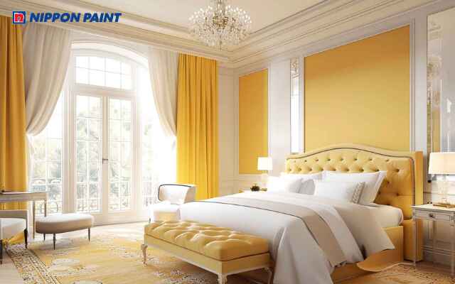 Mẫu 7: Phòng ngủ màu vàng nhạt kết hợp ánh sáng tự nhiên tạo cảm giác ấm áp và tươi sáng