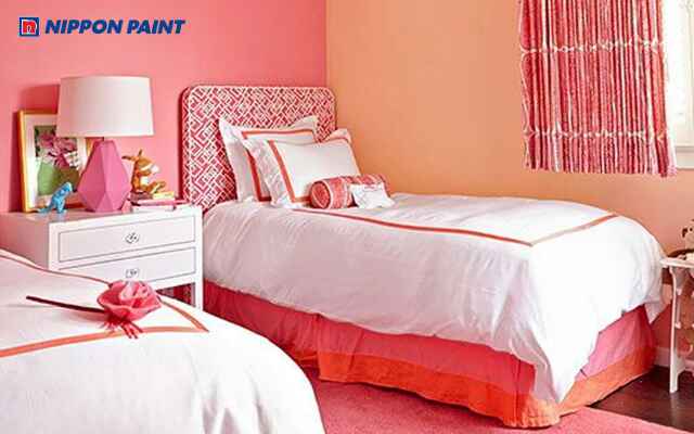 Mẫu phòng ngủ sơn màu hồng cam tươi trẻ và năng động phù hợp cô gái cá tính