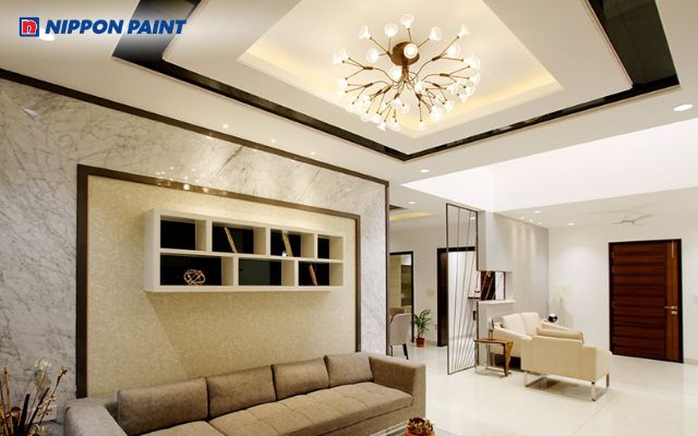 Với màu trắng - đen độc đáo, trần bê tông trở thành điểm nhấn nổi bật của phòng khách