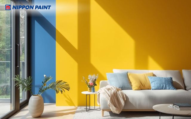 Sự kết hợp giữa màu vàng và xanh dương mang đến diện mạo trẻ trung, năng động cho phòng khách