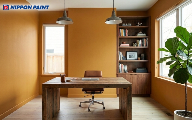 Sơn toàn bộ các bức tường màu vàng đất giúp bạn tập trung vào công việc