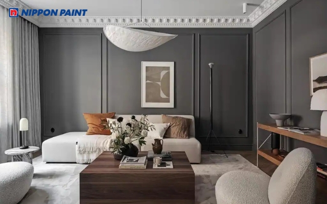 Phòng khách hiện đại với tông màu xám trung tính, nội thất tối giản và ánh sáng tự nhiên