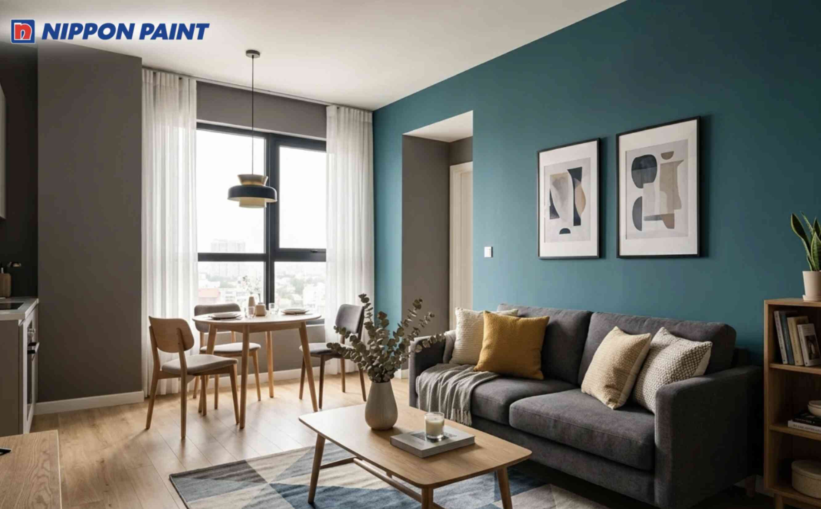 Phòng khách sử dụng tường xanh cổ vịt kết hợp sofa xám ghi