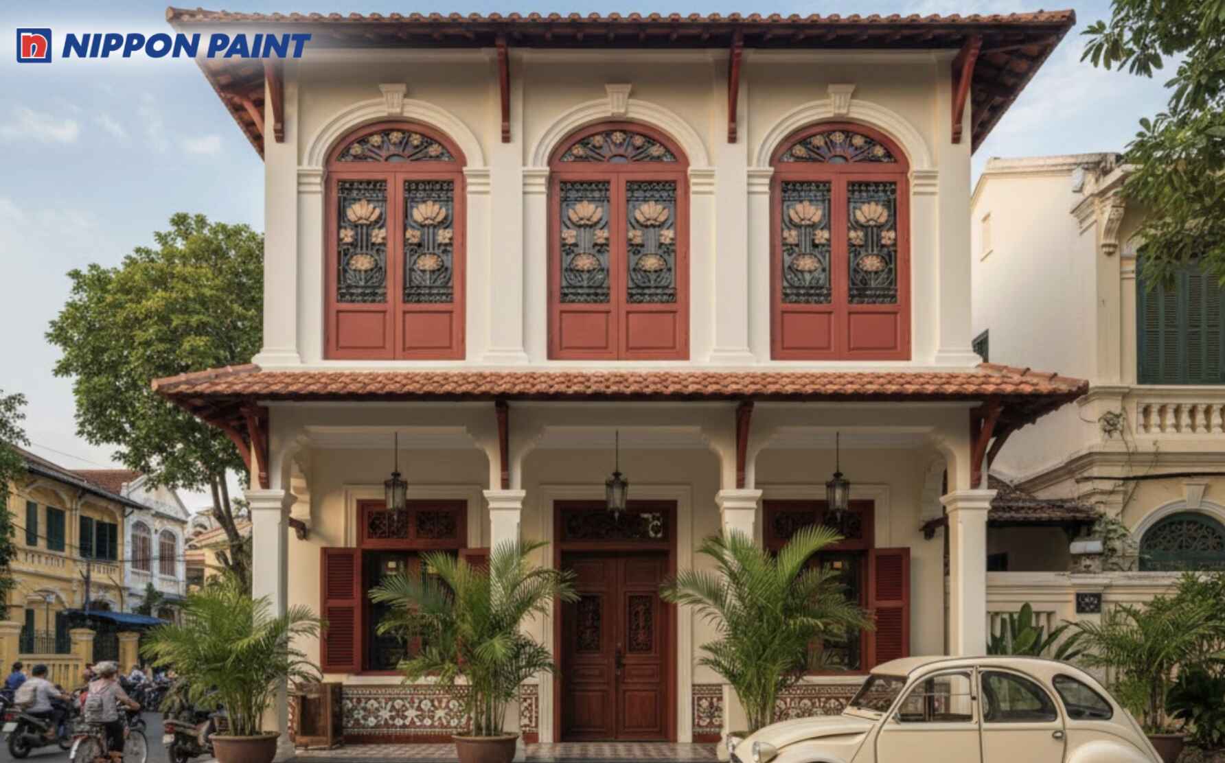 Bảng màu be kết hợp đỏ đậm được tiết chế hợp lý, giúp nhà phố thanh lịch hơn