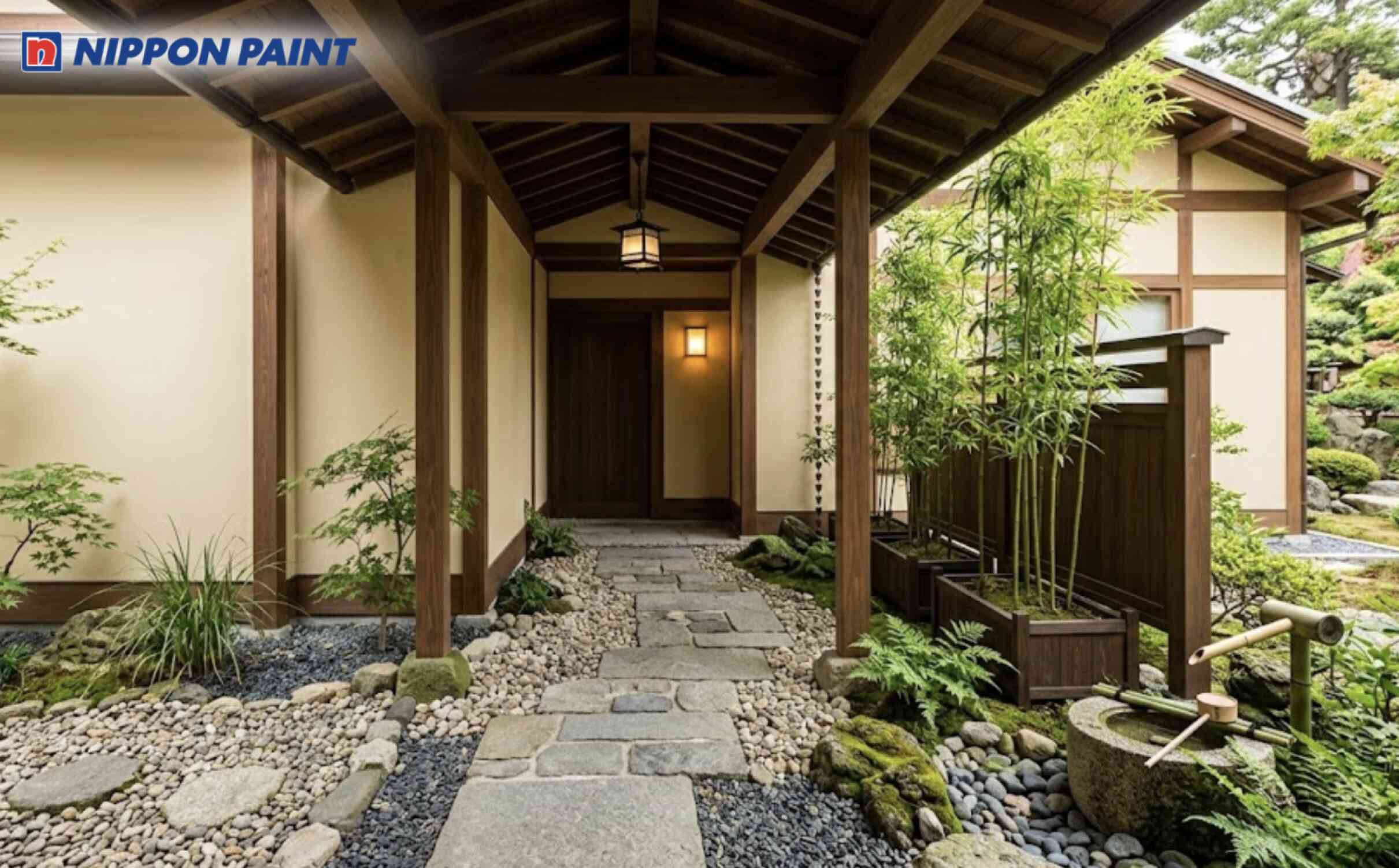 Lối đi hiên nhà mộc mạc với tông kem sáng kết hợp nâu gỗ trầm, điểm xuyết tre và sỏi nhỏ