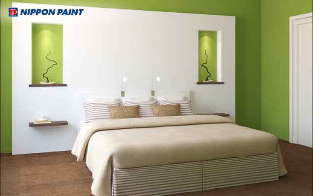 Phòng ngủ sơn 2 màu xanh lá và trắng tạo không gian tươi mới, sinh động và thư giãn