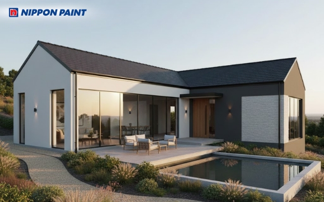 Nhà chữ L phủ sắc trắng thanh lịch, mang lại cảm giác rộng rãi và cân đối cho tổng thể kiến trúc