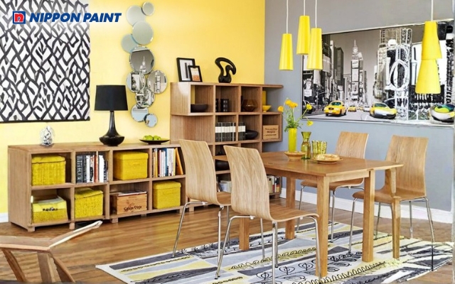 Màu xám tiết chế độ rực của vàng chanh giúp căn phòng trở nên yên tĩnh và ấm cúng hơn