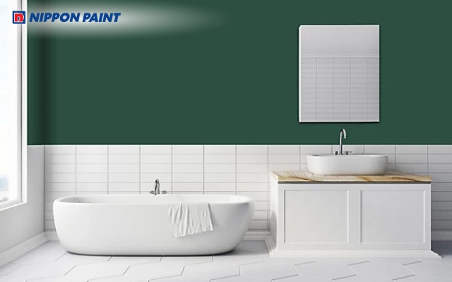 Sự kết hợp giữa xanh rêu và gạch trắng giúp phòng vệ sinh luôn trông sạch sẽ