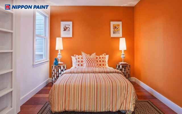 Phòng ngủ màu cam trung tính kết hợp ga giường và rèm sáng tạo không gian thư giãn