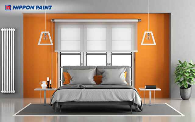 Sơn tường cam kết hợp xám làm nền và nội thất tạo sự cân bằng, sinh động