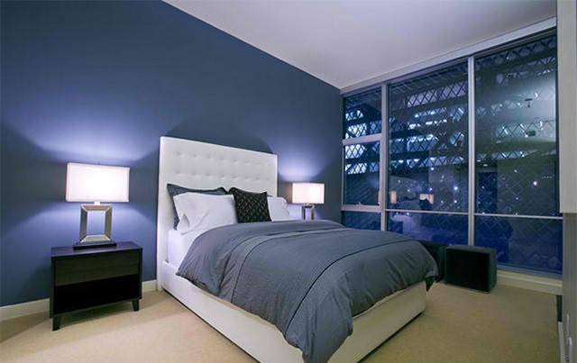 Với mẫu sơn phòng ngủ màu xanh đặc trưng, không gian ngủ của bạn sẽ trở nên độc đáo và ấn tượng hơn. Hãy để bức ảnh này truyền cảm hứng cho bạn tạo ra một không gian sống thật đặc biệt!