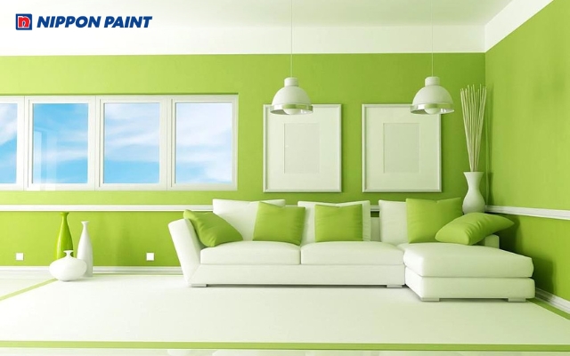 Phòng khách sử dụng sơn xanh lá nhạt phối trắng mang cảm giác nhẹ nhàng và thư giãn