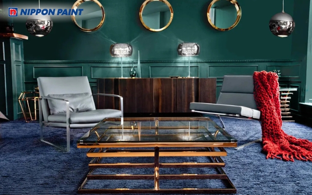 Phòng khách sử dụng xanh lá và xanh dương giúp tổng thể hài hòa, dễ chịu