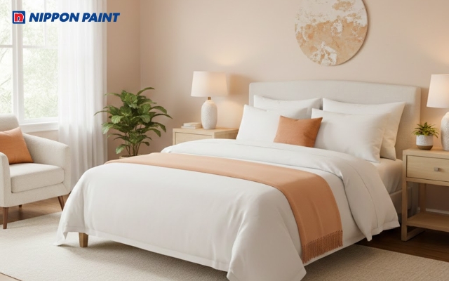 Mẫu phòng ngủ nhẹ nhàng phối tông màu cam nhạt cùng bộ chăn ga trắng tinh khôi và thanh lịch