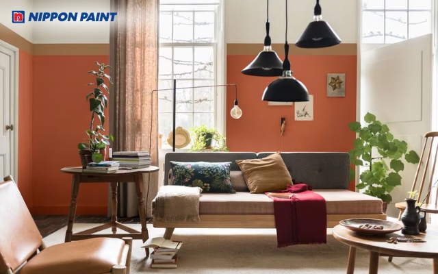 Màu cam cháy mang đến vẻ đẹp cổ điển và cảm giác gần gũi cho phòng khách